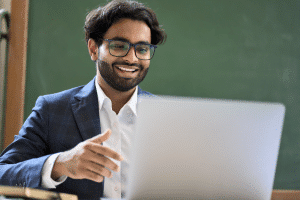 Indian teacher with computer | Edsby Edsby teacher